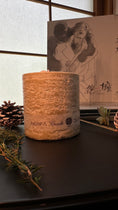 将图片加载到图库查看器中， 墙体纹理杯蜡烛
